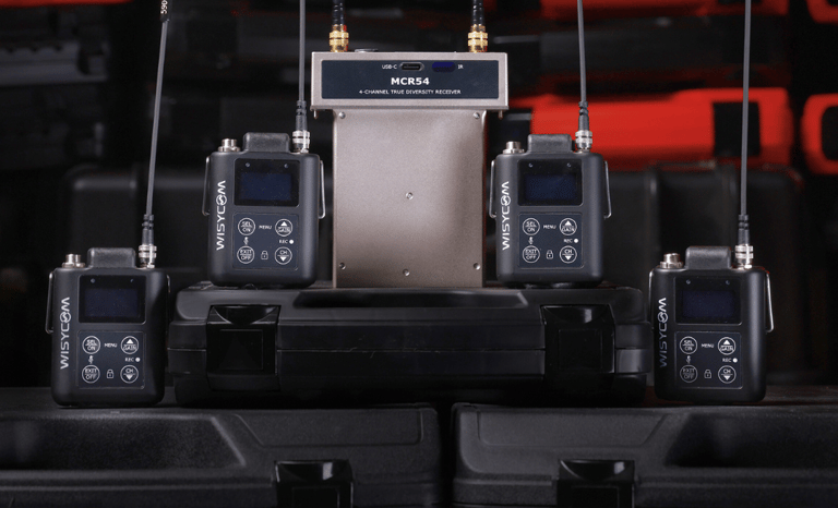 Wisycom wireless microphone system featuring MCR54 receiver and bodypack transmitters for profession