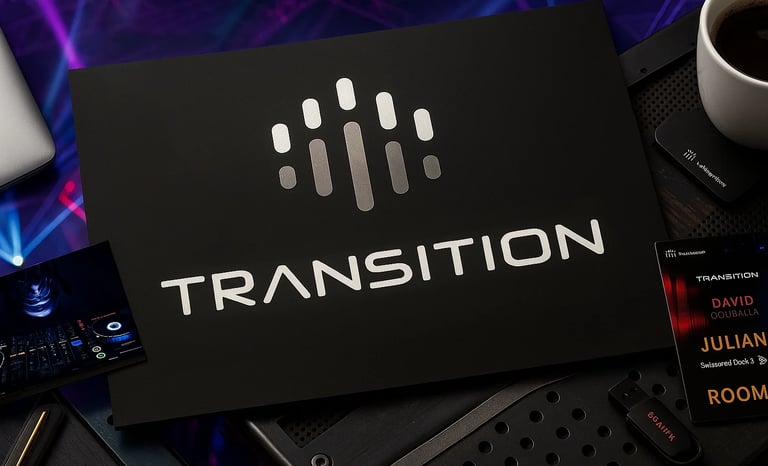 a laptop computer sitting on a desk with a laptop and a cup of coffee