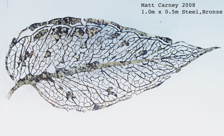 steel sculpture of a skeleton leaf