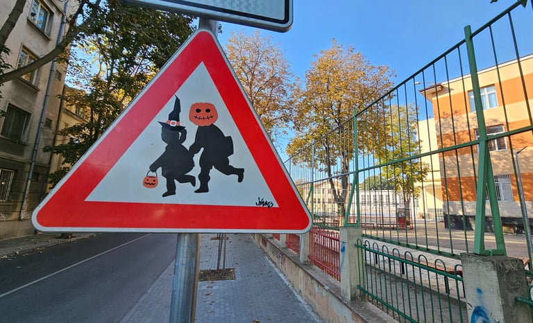 a street sign with a cartoon character on it