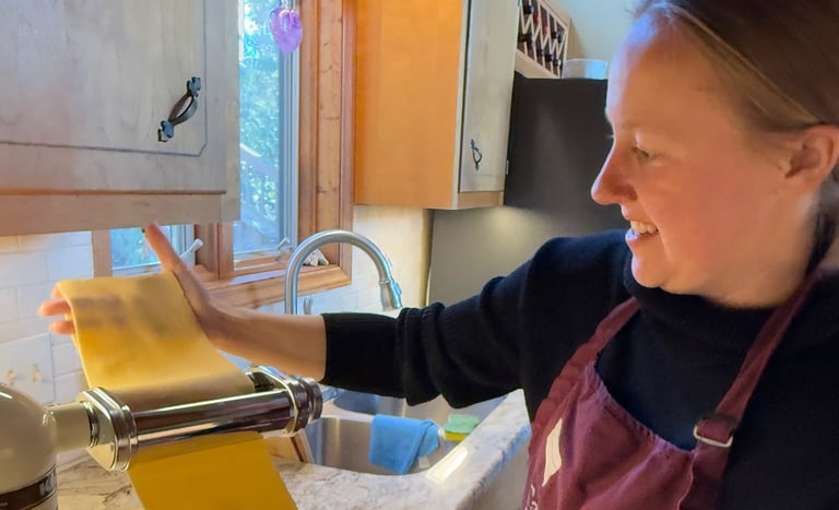 Class participant making an authentic pasta noodle