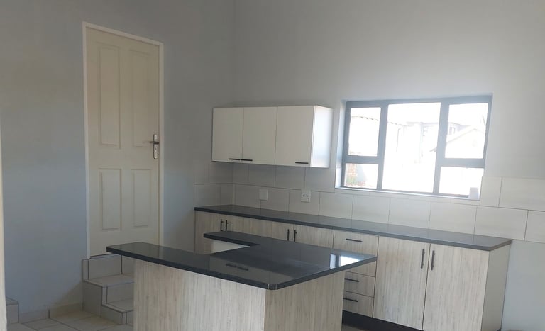Completed kitchen in Wildtuin Park Estate home.