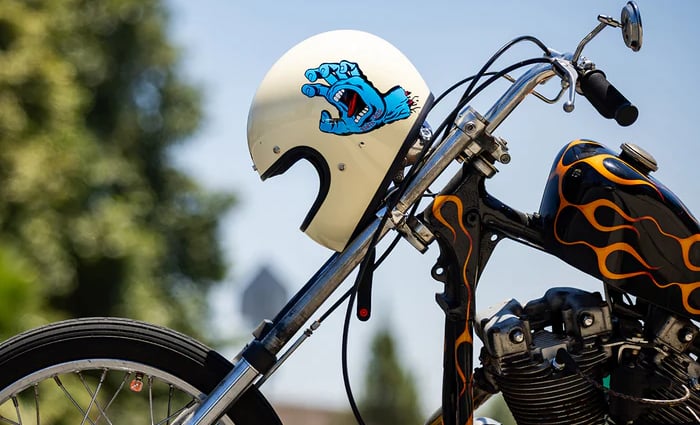 a motorcycle with a helmet on and a helmet on