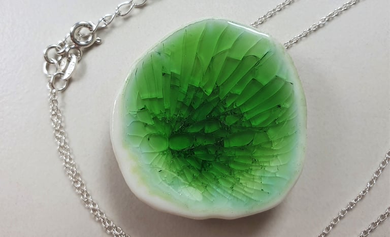 The Eden Holistic Health Studio, Gift Shop, Porcelain and Sterling Silver, Emerald, Pendant.