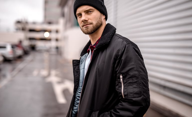 Fashion photography - a man in a black jacket and beanie
