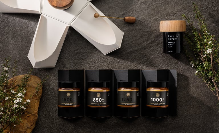 Product photography - A display of honey on a stone background