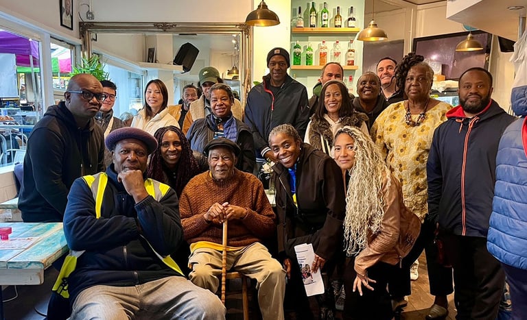 a group of people with Leslie Palmer