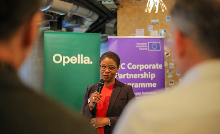 Corporate event videography team filming keynote