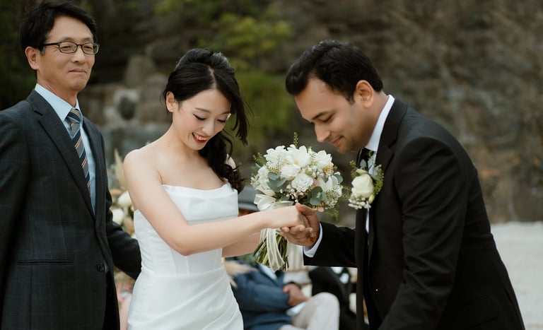 a man and woman getting married in a wedding ceremony