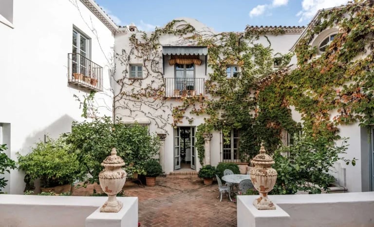 Finca Santa Katerina main courtyard with statues and balconies