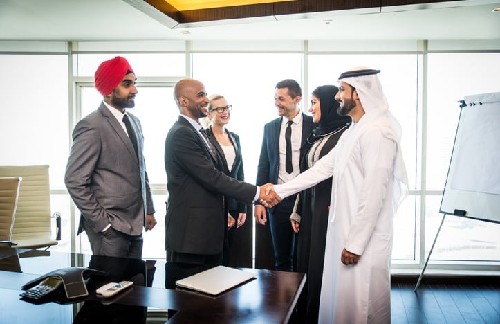 Business People Shaking Hands at a Meeting