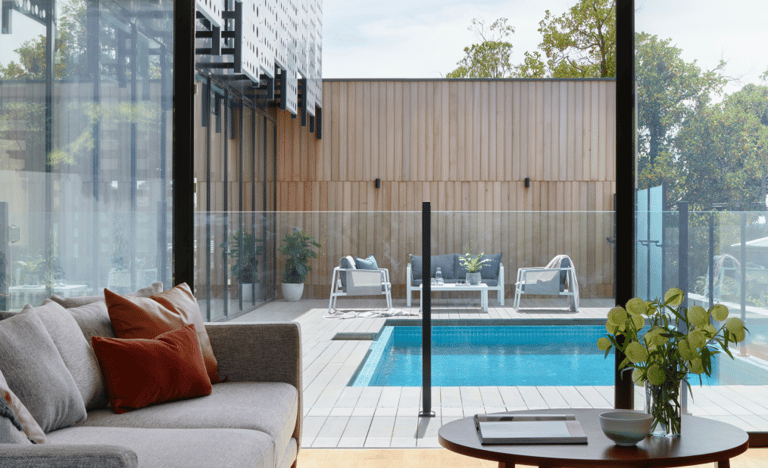 Modern luxury home exterior with pool – residential real estate transaction representation