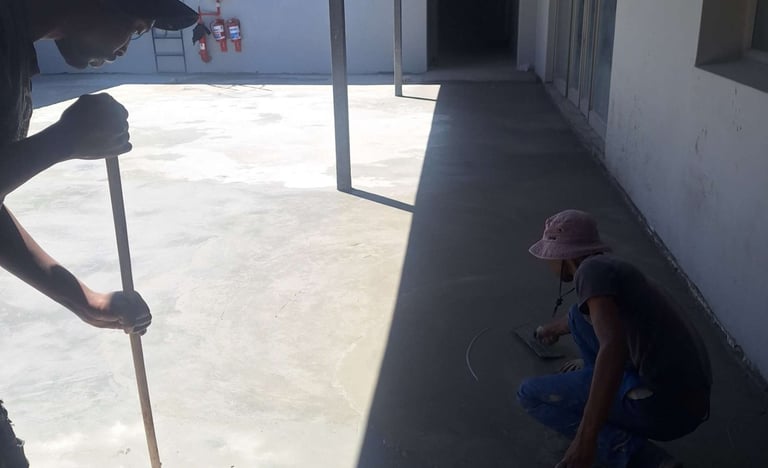 Floating surface area of specialized waterproofing screed application, Harbor Bay Mall, Simon"s Town, Cape Town