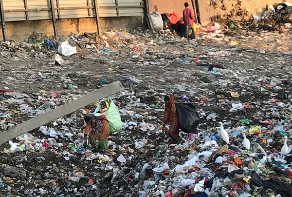 Waste pickers. on a huge rubbish dump in India