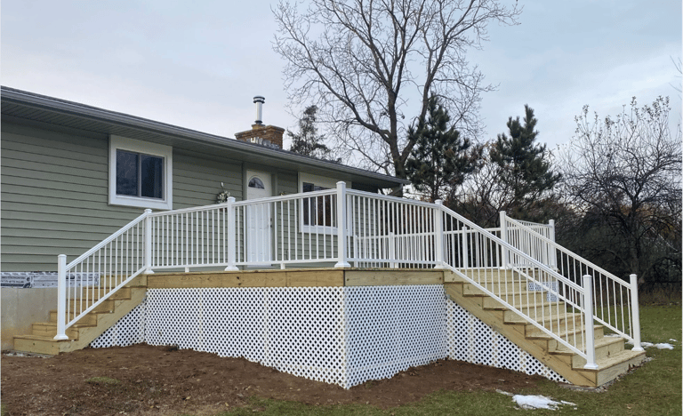 wood deck with pvc railings by paramount exterior llc