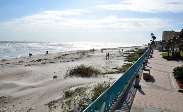 daytona beach with people walking on the sand