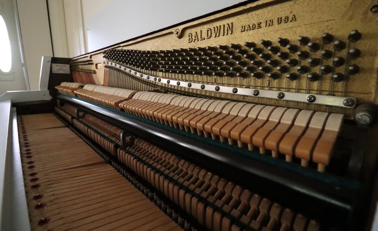 inside of baldwin spinet piano