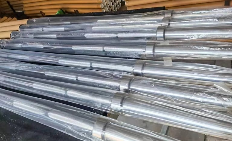 Finished barbells packaged for bulk shipment and wholesale distribution