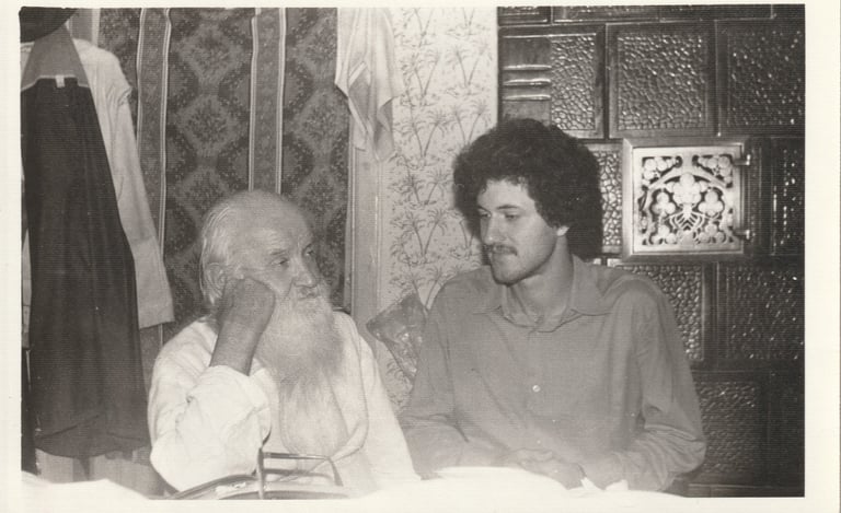 Vintage black and white photo of Vergiliu Neculau talking to Eugen Mirtz