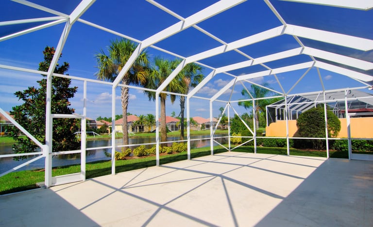 St Petersburg concrete pool deck and patio installation with screened lanai