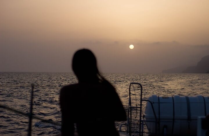 Sunset view from the Sea Born catamaran at Cabo Girão, Madeira.