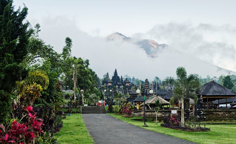 Traditional Balinese architecture at Besakih Temple surrounded by lush mountain scenery