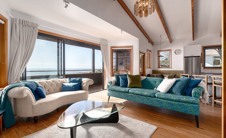 The Gallery Kaikoura living room with sea and mountain views