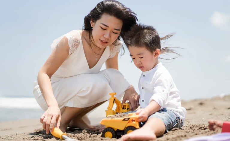 Mother and son sharing a quiet moment during a natural family session at W Bali Seminyak