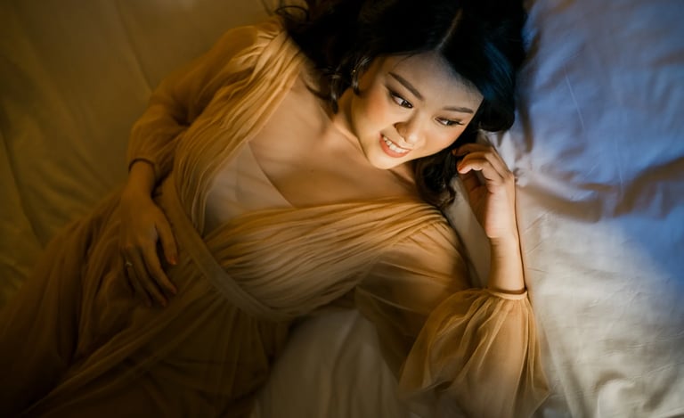 Elegant maternity portrait inside a luxury suite at The Apurva Kempinski Bali