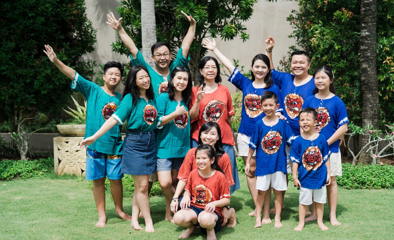 Playful extended family group interaction at Lumbini Villas Jimbaran Bali capturing energetic and candid moments together