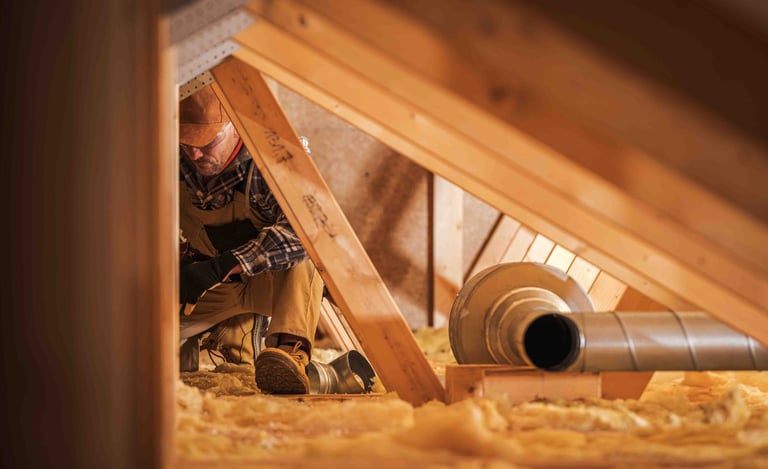insulation worker in an attic