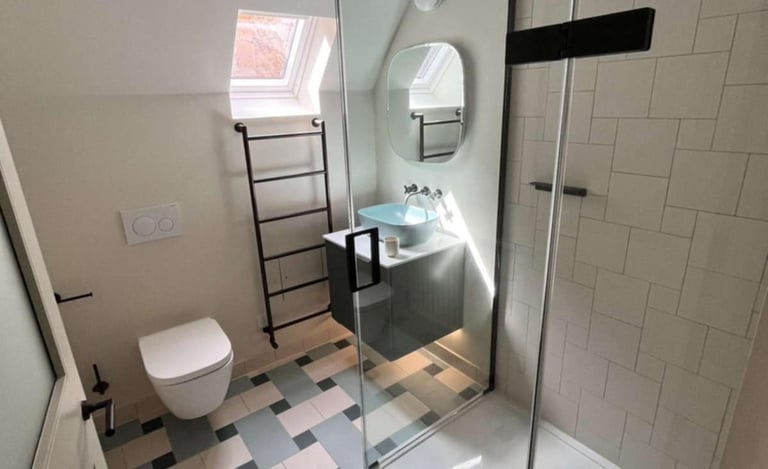 Vertical designer radiator installed in Worcester property for style and warmth