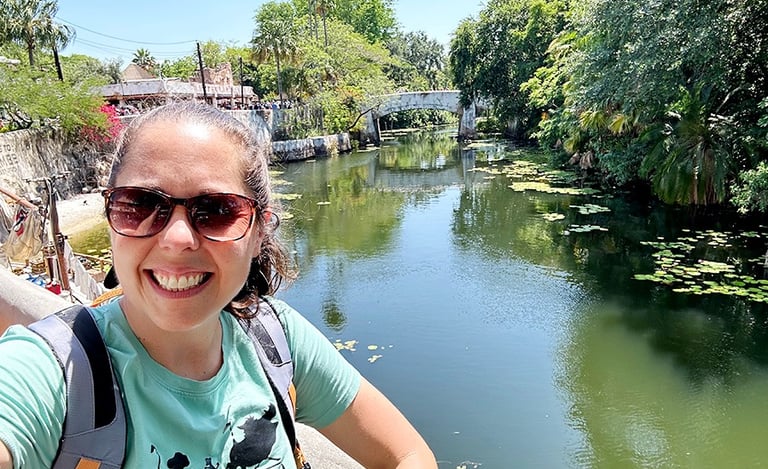 Jennifer Becker pictured inside Disney's Animal Kingdom® Park at Walt Disney World®.