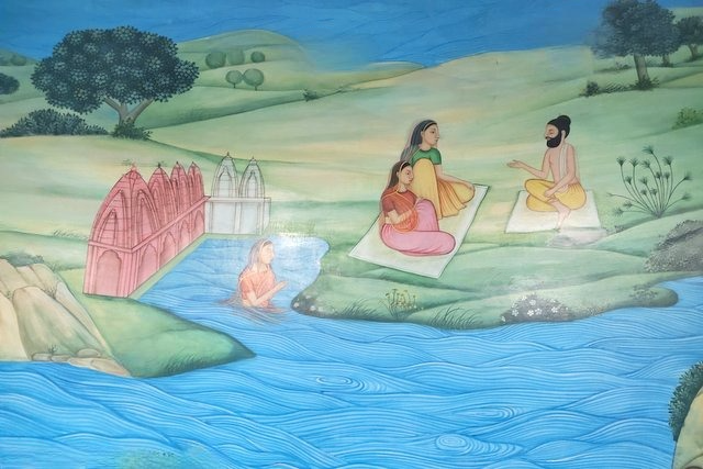 Sage Kapila teaching Sankhya Yoga to Devahuti at Bindu Sarovar in Siddhpur.