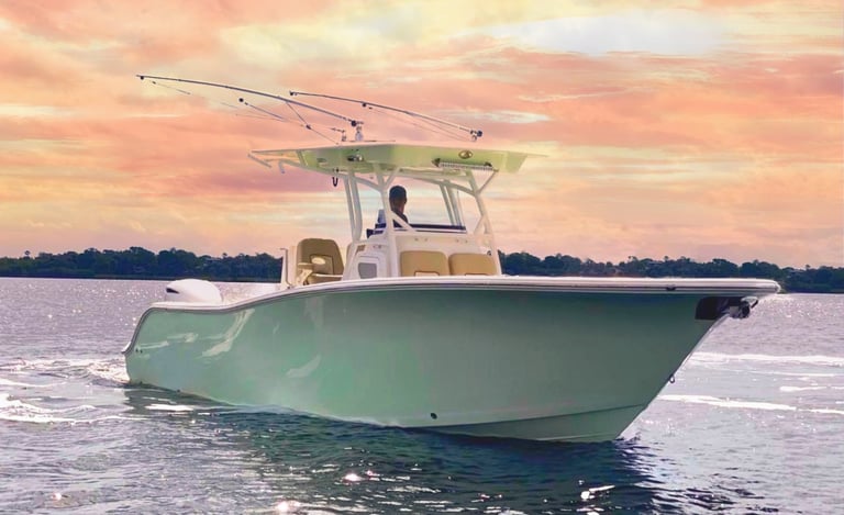 a man fishing on a boat in the water
