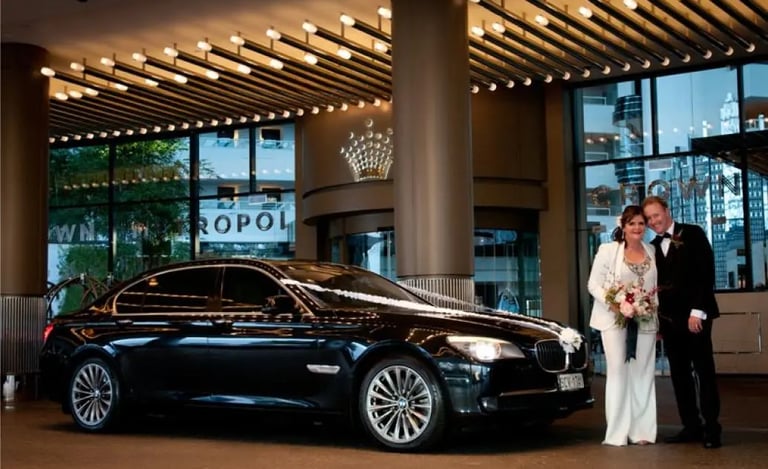 Luxury wedding chauffeur service with premium black vehicle