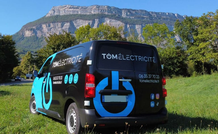 a van with a blue and white sign on it