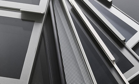 Assorted styles of metal ventilation decorative panels, including grid-textured and flat design architectural building materi