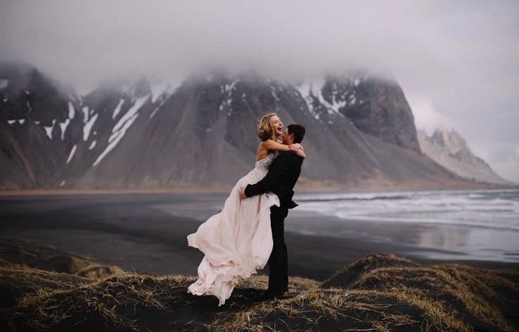bride and groom Iceland black sand beach wedding