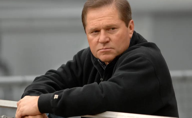 Scott Boras, MLB Super Agent, sitting at a conference.