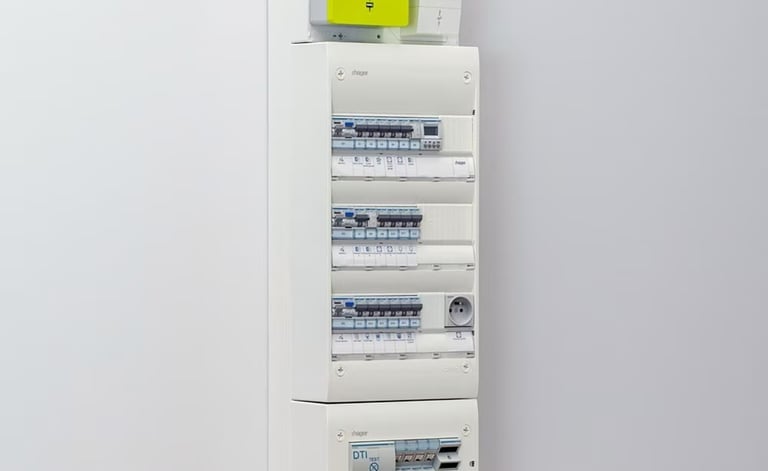 a wall mounted electrical device with a yellow and white panel