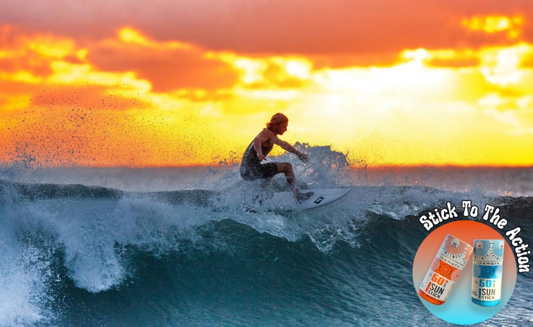 a man riding a surfboard on a wave