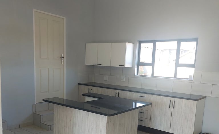 Completed kitchen in Wildtuin Park Estate home.
