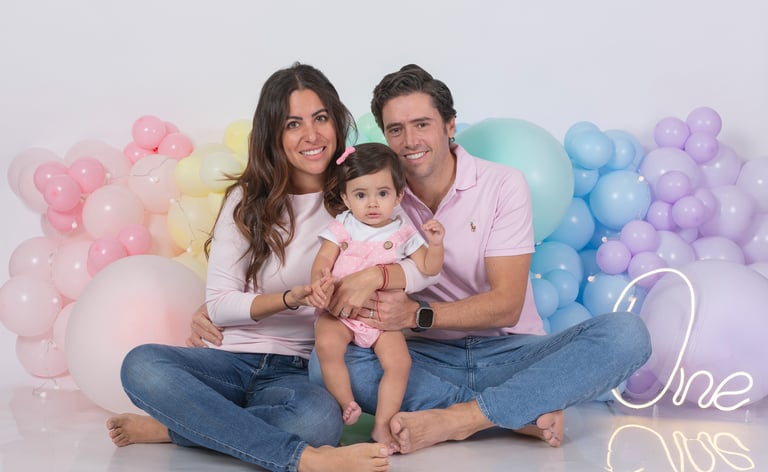 a baby boy in a circus themed birthday party