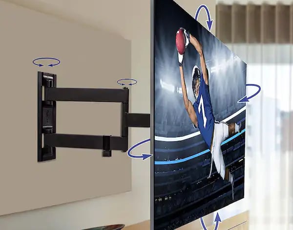 a tv screen mounted on a wall mounted tv