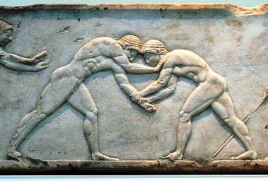 Αρχαία πάλη σε μάρμαρο Πεντέλης. By Fingalo, https://el.wikipedia.org/wiki/Πάλη 