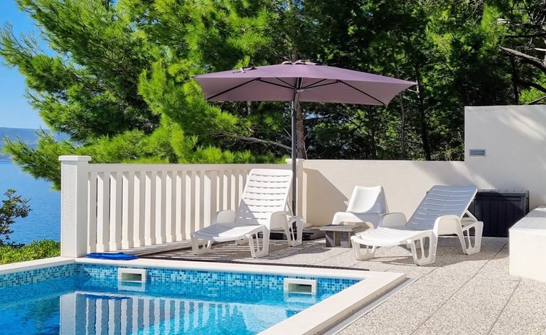 The photo shows a west sun terrace.
