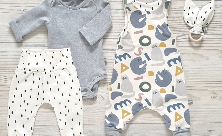 a baby's clothes and accessories for a baby's first year