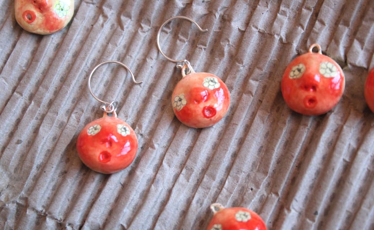 flower eye earrings