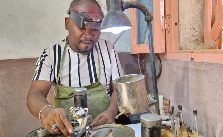Tahiry working in his workshop in Antananarivo